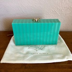 Charlotte Olympia plastic clutch